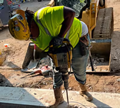 Photo of Summit Academy Alum, Edina, on the job