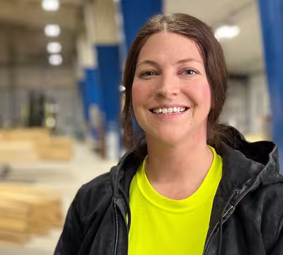 Photo of Summit Academy Alum, Veronica Lamson, on the job at Simonson Lumber