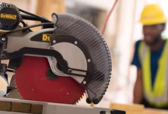 Construction saw with a student in the background