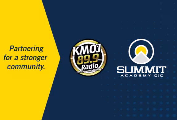KMOJ and Summit Academy logos with the text "Partnering for a stronger community."