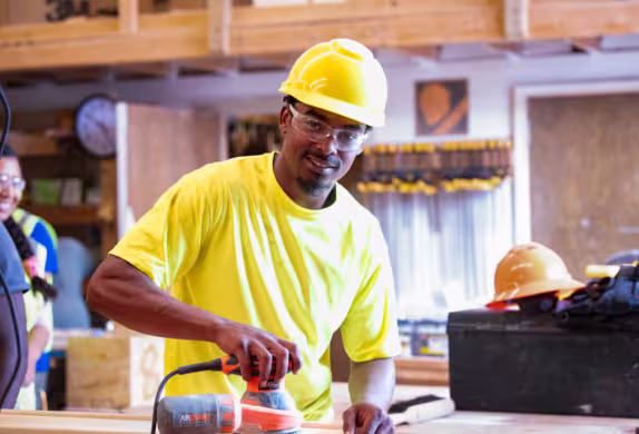 Carpentry student using power tools