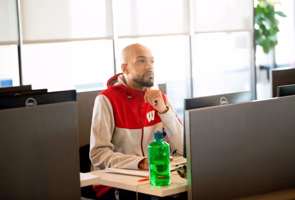 Summit Alum, Albert Hibbs in IT classroom