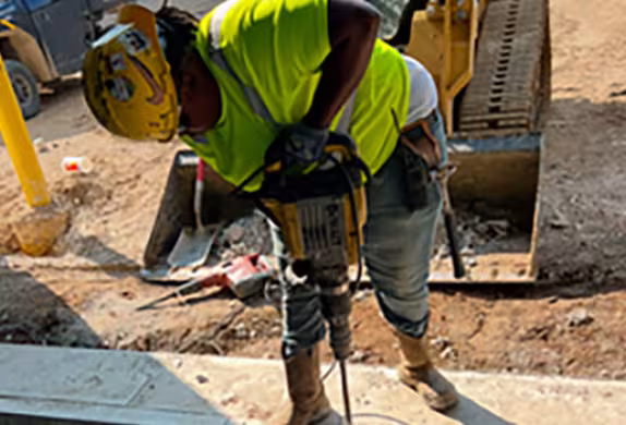 Photo of Summit Academy Alum, Edina, on the job