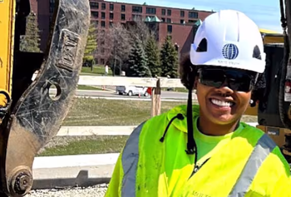 photo of Summit Academy carpentry graduate, Treasure, on the job.