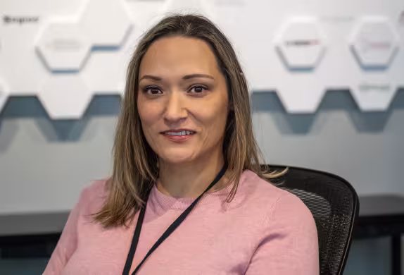 Photo of Angela, Summit IT alum, working at Atomic Data