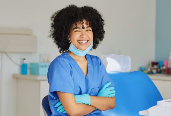 dental assistant in exam room
