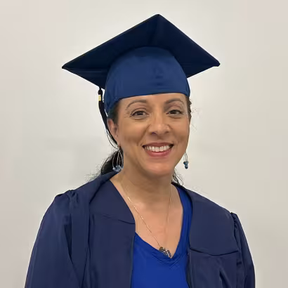 Photo of Summit alum, Rita, at 2026 commencement ceremony