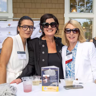 Attendees of Summit's Annual Golf Classic and Summer Party at cocktail hour