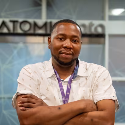 Photo of Marcus, Summit Academy graduate, at Atomic Data.