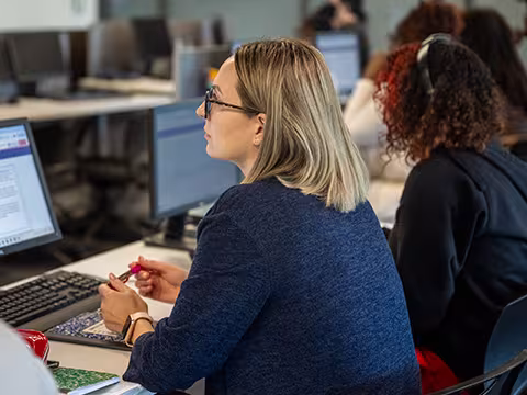 student in financial services classroom