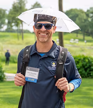 Summit employee at the annual golf classic and summer party event