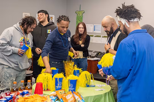 Group of GED students at a celebration at Summit Academy