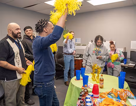 Group of GED students at a celebration at Summit Academy