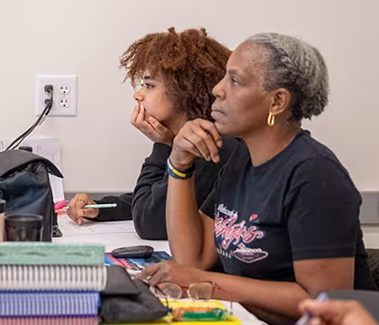 Medical Administrative Assistant students listening to instructor in classroom
