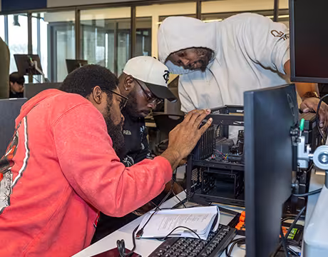 IT students working on project in classroom