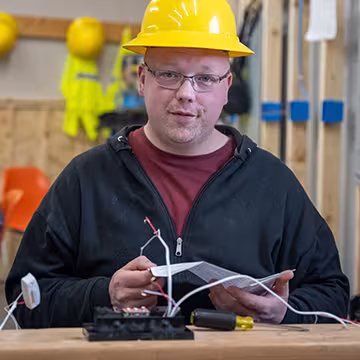 Electrician student learning in classroom