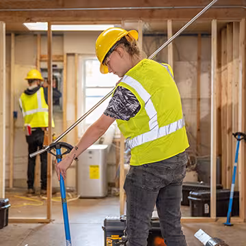 Electrician student pipe bending