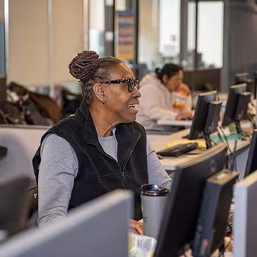 student in financial services classroom