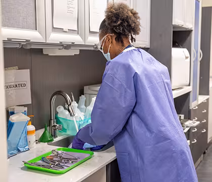 Unlicensed Dental Assistant student in the sterilization lab
