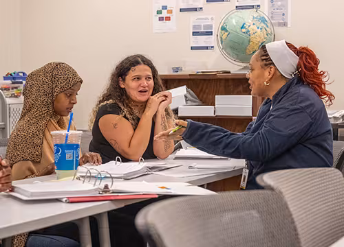 GED students in a group activity in class