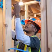 Electrician student learning wiring hands on