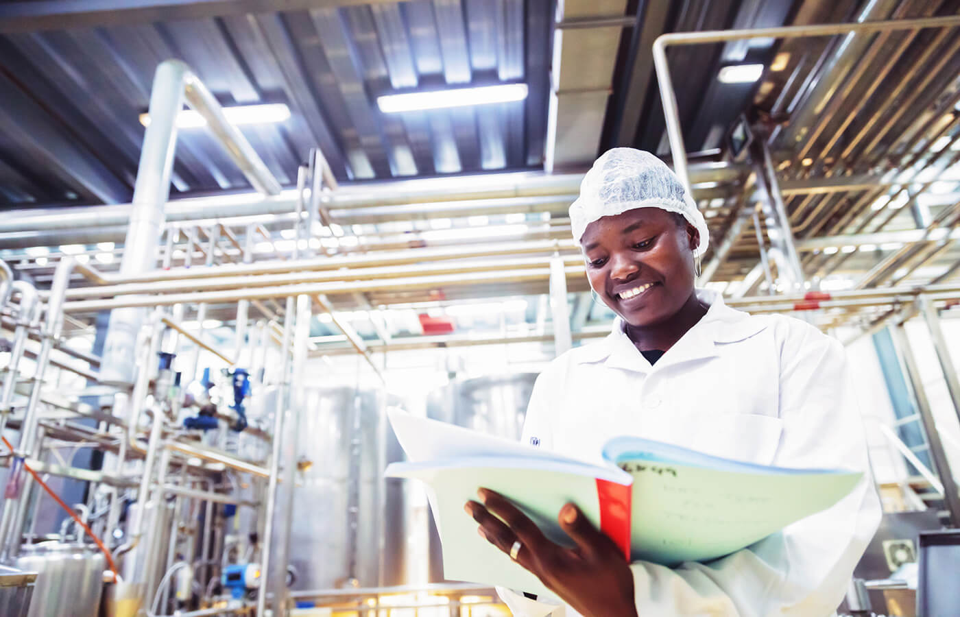 woman working in food manufacturing industry